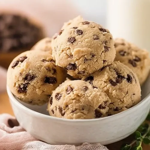Gluten free edible cookie dough with chocolate chips in a small bowl